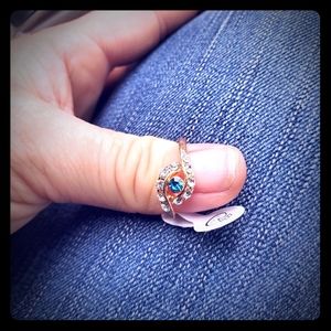 Size 7 rose colored ring